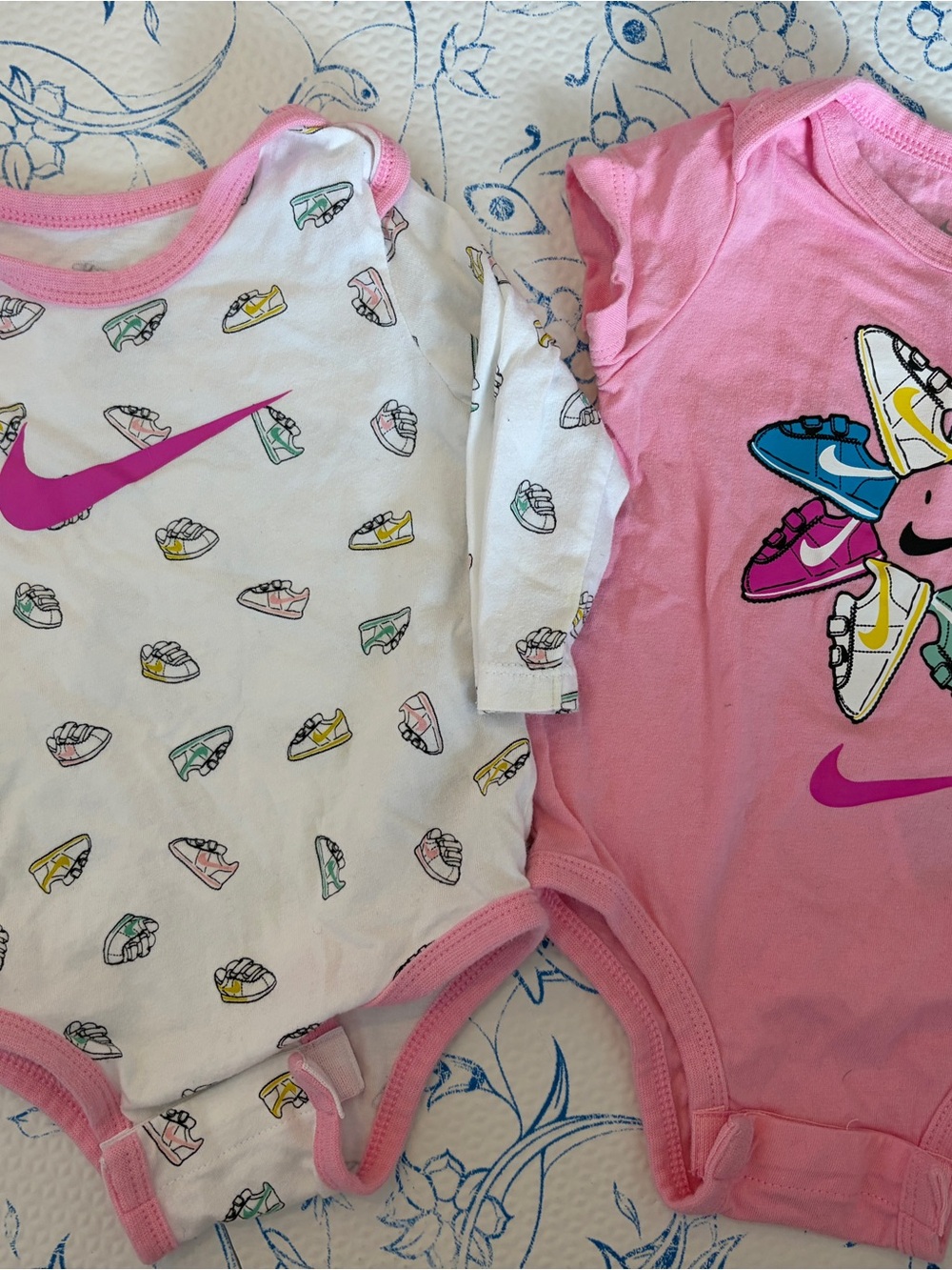 Nike Pink and White Baby One-Piece Bodysuit Duo with Sneaker Print